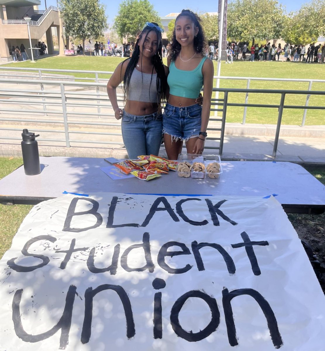 Isabella Houston (24) and Victoria Hyatt (24) at the Black Student Union booth on Sept. 20, 2023. 