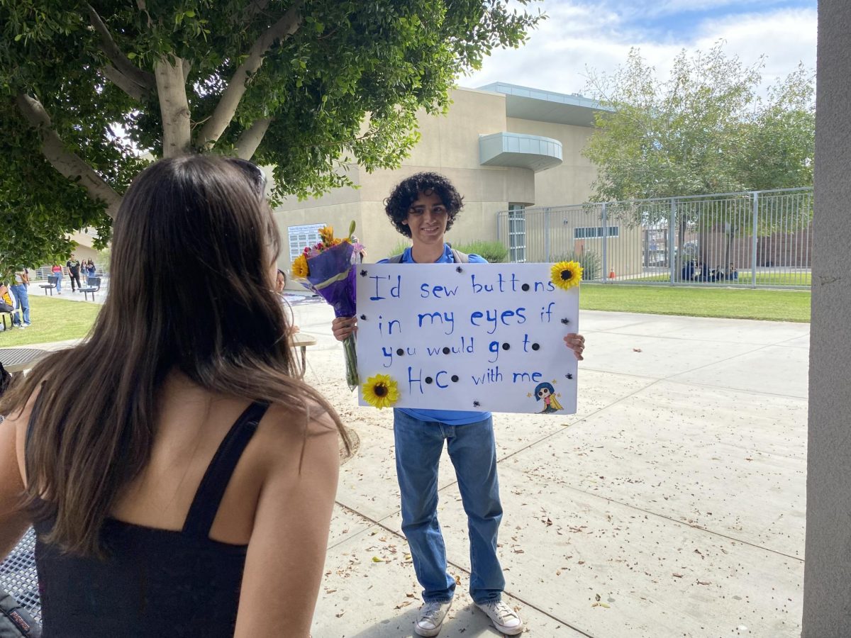 Jessie Lopez (’25) asks Coralie 
Cambron (’25) to the Homecoming 
dance on Sept. 27, 2023. She said yes.