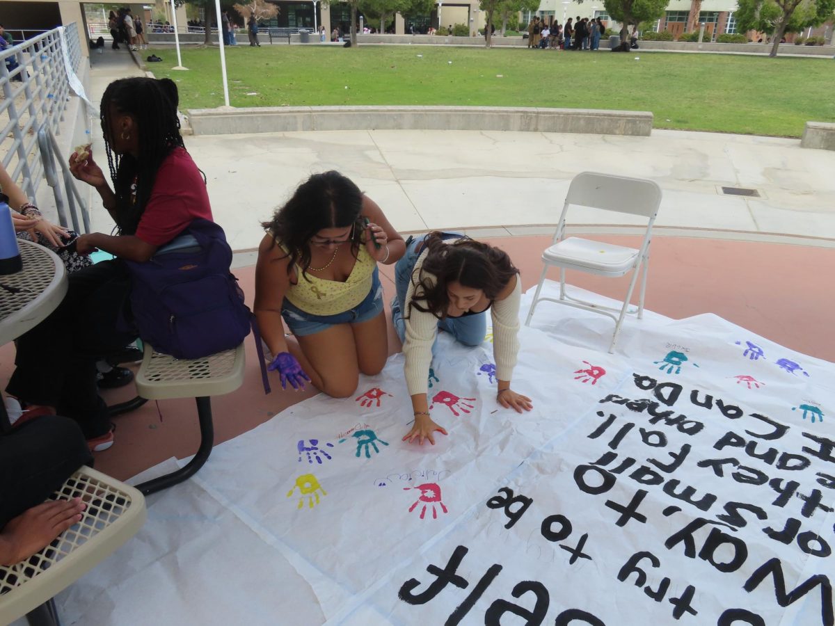 On Sept. 20 in the quad students leave their handprints as a pledge to be kind to others.