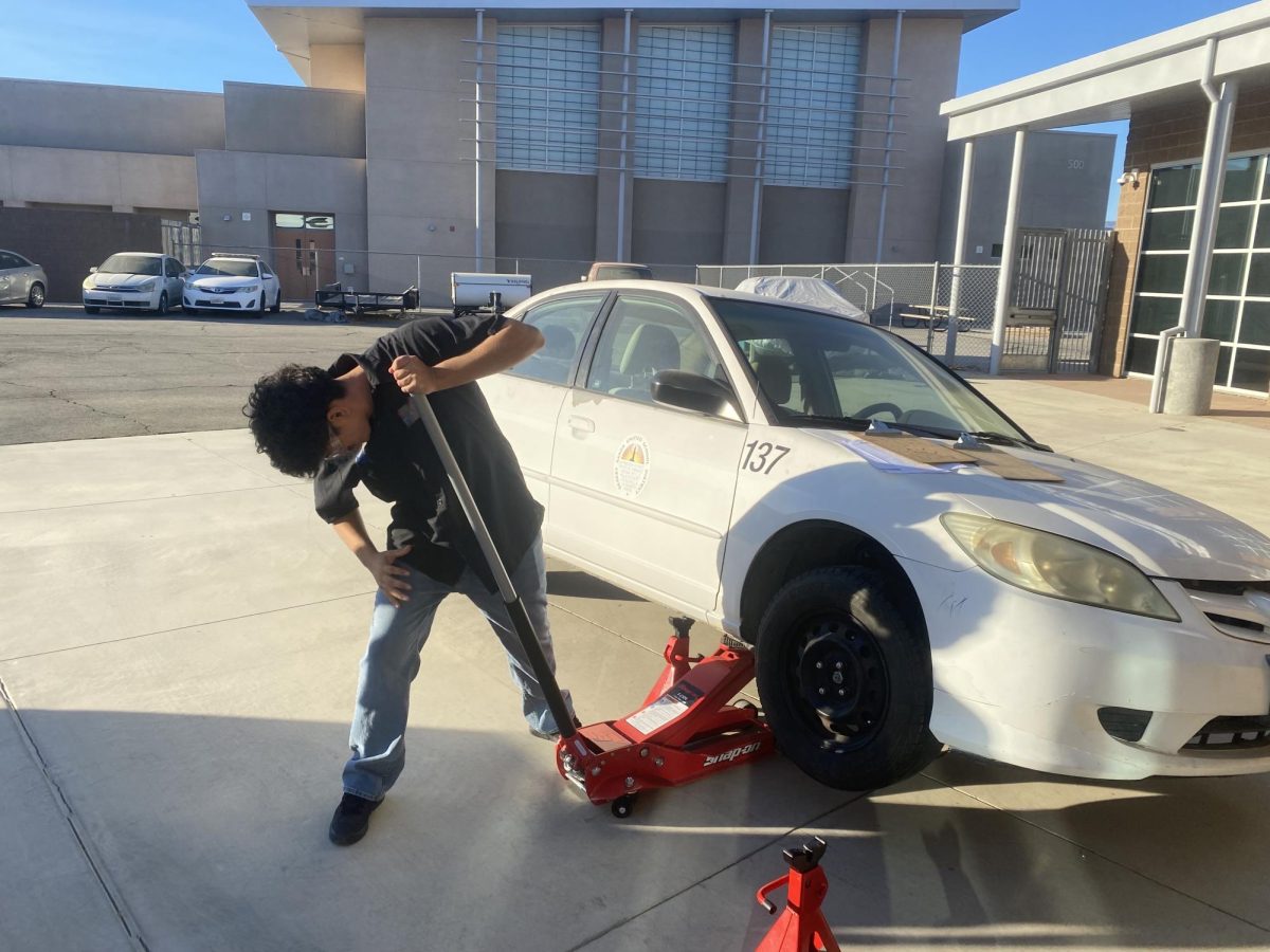 A student works on a DSUSD vehicle during an Automotive Technology Program class on Dec. 19, 2024. 