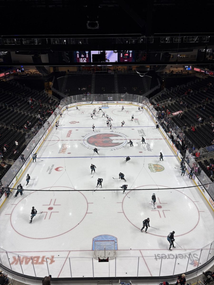 The Firebirds and the San Jose Barracuda warm up before a game at Acrisure Arena on Dec. 18, 2024. 