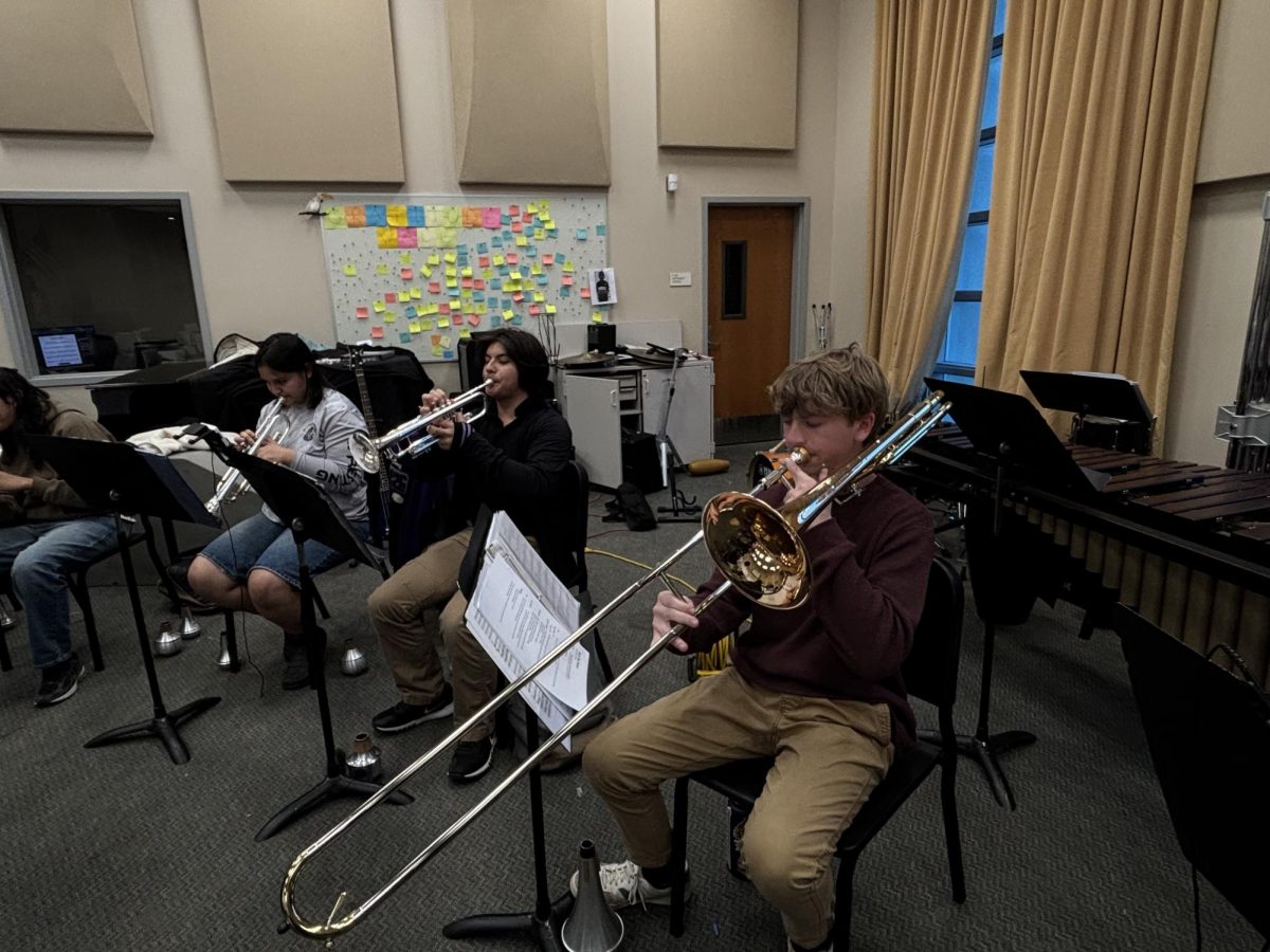 Noah Thompson ('28) and Quinn Greely ('27) practice their instruments during Wind Ensemble practice on Feb. 19.